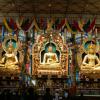 Golden statues of Buddha Shakyamuni, Padmasambhava and Buddha Amitayus