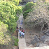 People walking towards to cave temple at Mahabalipuram