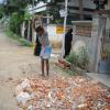 A boy working hard to break the bricks at Ganga Nagar, Kolathur- Chennai