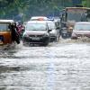 Vehicles Moving through the Rain Water in Chennai