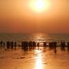 People enjoying in the beach of Mumbai at Sunset