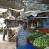 A salesman at vegetables shop in Srivilliputhur market in Virudhunagar district