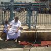 People taking rest inside Tirupati Temple, Chittoor