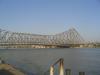 Howrah Bridge - a famous symbol of Kolkata is built over the Hoogly River and it connects the city of Howrah to Kolkata