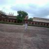 Boy Walking on the Red Fort Ground