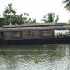 Closeup view of House Boat along with trees at Alappuzah