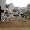 Karate Master giving instruction to the Students during their belt test
