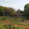 Visitors sitting at the park in Mamallapuram