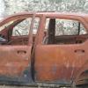 Old damaged Car standing in Rajagiramani Thottam