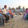 People relaxing in kovalam beach