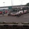 Bus coming out of Koyambedu Bus Terminus Entrance