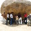 Trying to lift Mahabalipuram Rock