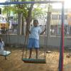 A little boy on swing at Sanmuganar park at Tiruvottiyur in Chennai...