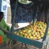 A woman selling mangoes at Pozhichalur in Chennai...