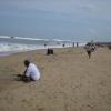 People sitting on the Elliots beach at Besant Nagar in Chennai...