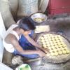 Child Making Sweets in Durgapur