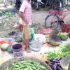 Boy Waiting for buyers in a local market, Durgapur