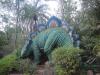 Statue of Stegosaurus in a park