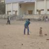 Boys playing cricket, Gwalior Trade Fair