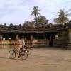 Children riding bicycle near the Harihareswara  temple