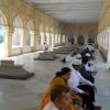 People relaxing inside the Mecca Mosque