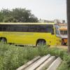 Rajalakshmi Engineering College bus parked in a open ground in Thandalam