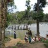 People walking along the River in Madikeri