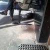 Dog taking rest under the chair at Madurai Railway Junction