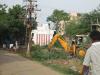 Workers and JCB Machine on Duty, Mangadu