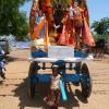 Baby tied to  pull the chariot at Singamparai Punitha Rayappar church