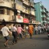 People walking in busy street in Mumbai