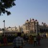 People walking around Mysore Palace