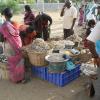 People buying fish in poombuhar beach