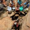 Group of Women taking water from Mountains, Kerala